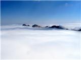 pogled z vrha proti goram na Krmo(Debela peč in ostali vrhovi)