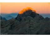 Slovenske gore ob sončnih vzhodih in zahodih Pogled na Mangart