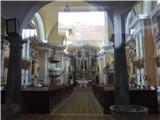 in pre dohodom še pogled skozi šipo v notranjost cerkve sv. Andreja v Vačah